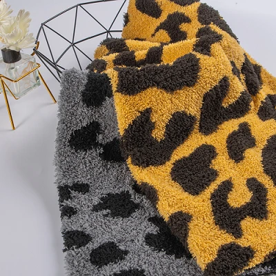 Tkanina Sherpa z leopardjim vzorcem