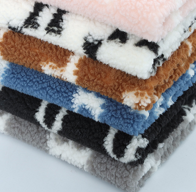 Dvostranska sherpa tkanina